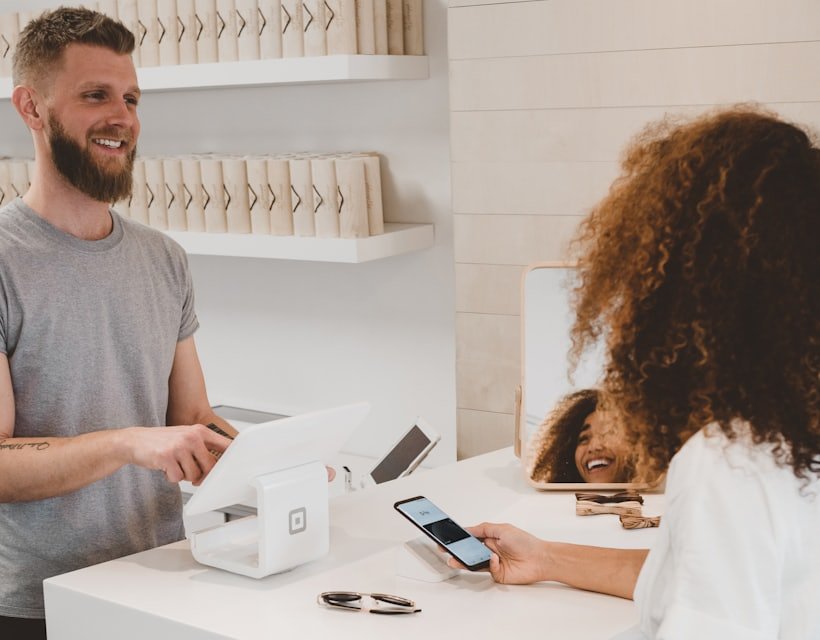 An advisor helping a business owner in person